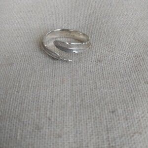 Fiyah: marked feather wrap ring.